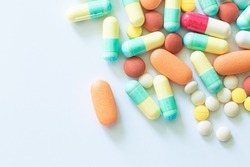 Pills and capsules on a white background,Different colorful pills on white background