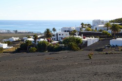 The beautiful village Tabayesco with view to the Atlantic Ocean, Lanzarote, Canary Islands, Spain