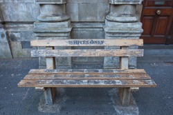 For whites only - a bench in Cape town. Bench with the inscription, as the memory of apartheid and segregation in South Africa.