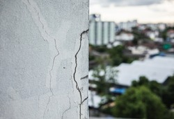 Color cracks of the building. Cracks in high-rise buildings are at risk of collapsing. Buildings that are extremely unstable require insurance.