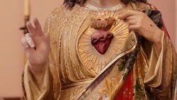 Sacred Heart of Jesus - Jesus shows his own heart, symbol of God's love - Nine First Fridays Devotion
