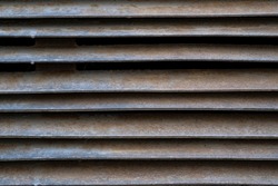 Texture of an old metal ventilation grill.