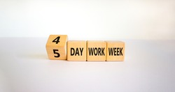4 or 5 day work week symbol. Turned the cube and changed words '5 day work week' to '4 day work week'. Beautiful white background. Copy space. Business and 4 or 5 day work week concept.