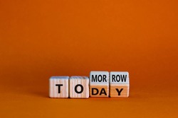 Do it today not tomorrow. Turned wooden cubes and changed the word 'tomorrow' to 'today'. Beautiful orange background, copy space. Business and tomorrow or today concept.