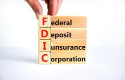 FDIC federal deposit insurance corporation symbol. Concept words FDIC federal deposit insurance corporation on blocks on white background. Business FDIC federal deposit insurance corporation concept.