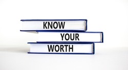 Know your worth symbol. Concept words Know your worth on books. Beautiful white table white background. Business and know your worth concept. Copy space.