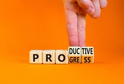 Word progress and productive symbol. Businessman turns cubes and changes the concept word Productive to Progress. Beautiful orange background. Business progress and productive concept. Copy space.
