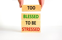Too blessed to be stressed symbol. Concept words Too blessed to be stressed on wooden blocks. Beautiful white table white background. Psychological and too blessed to be stressed concept. Copy space.
