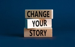 Change your story symbol. Concept words Change your story on wooden blocks on a beautiful grey table grey background. Business, finacial and change your story concept. Copy space.