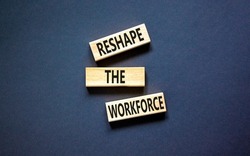 Reshape the workforce and support symbol. Concept words Reshape the workforce on wooden blocks. Beautiful black table black background. Business reshape the workforce quote concept. Copy space
