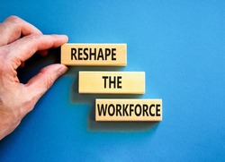 Reshape the workforce and support symbol. Concept words Reshape the workforce on wooden blocks. Businessman hand. Beautiful blue background. Business reshape the workforce quote concept. Copy space