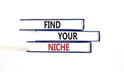 Find your niche symbol. Concept words Find your niche on books. Beautiful white table white background. Business and find your niche concept. Copy space.