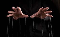 Man hands with strings on fingers. Manipulation, negative influence or addiction concept. Becoming dependent on alcohol, drugs, gambling. High quality photo