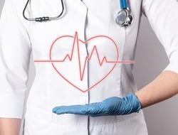 ECG. Heart with heartbeat rhythm over doctor hand. Electrocardiogram test conducting, cardiac diseases detection concept. Woman in lab coat with stethoscope. High quality photo