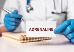 Adrenaline hormone, word on paper. High quality photo