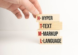 Closeup man add more some alphabets wood cubes into the row to complete the word html, converge benefits, mutal benefits concept
