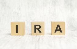 IRA - text is made up of letters on wooden cubes