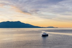 Boat anchored in Doe Bay, Orcas Island, during sunrise