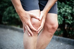 Meniscus tear in man athlete's knee, sports injuries concept