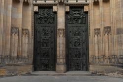Details of the old door from the Church of St. Vitus in the center of Phrana at Prague Castle during the day of the year. construction began in 930