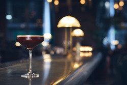 Espresso martini on bar in evening 