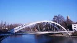 Bridge on river Adda. Modern architecture on river