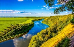 Beautiful river valley in summer. River valley panorama. River in valley. Summer river panoramic landscape