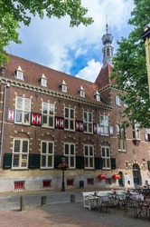 Holland. Utrecht: Street cafe and facade of an old building with unusual shutters