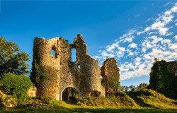 Ruin of a medieval castle. Ruined tower of medieval fortress