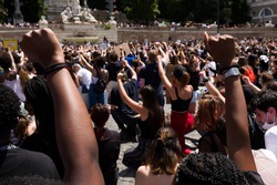 Rome - June 22, 2020: against racism and the killing of Geoge Floyd. The participants remained on their knees and with a high fist for 8'46 '' the time that the Minneapolis policeman kept Floyd stuck