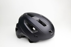 Black helmet on white. This helmet is used to practice cycling. Bike helmet. Black bicycle helmet. Isolated on white, clipping path included. 