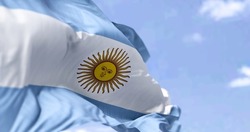 Detailed close up of the national flag of Argentina waving in the wind on a clear day. Democracy and politics. South american country. Selective focus.