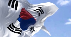 Detailed close up of the national flag of South Korea waving in the wind on a clear day. Democracy and politics. East Asian country. Selective focus.
