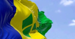 Detail of the national flag of Saint Vincent and the Grenadines waving in the wind on a clear day. Saint Vincent and the Grenadines is an island country in the Caribbean. Selective focus.