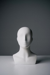Mannequin figure with minimalist black and white background