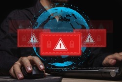 Computer system hack warning. The concept of a cyber attack on a computer network. Malicious software, viruses and cybercrime. Hacking personal data	