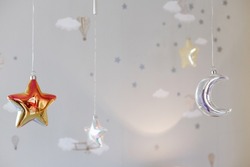 children's decoration in children's close-up. stars and the moon on ropes