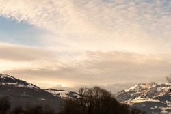 Vaduz, Liechtenstein, December 23, 2021 Cloud scenery in the late afternoon over the majestic alps