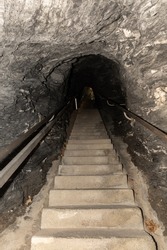 Zillis, Grison, Switzerland, April 12, 2022 Steps leading through a tunnel system at the Viamala canyon