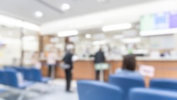 Medical blur background patient service counter, hospital lobby, cashier and pharmacy dispensary counter blurry interior inside waiting hall area