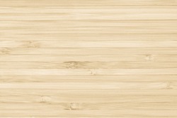 Bamboo natural wood texture pattern background in light yellow cream beige brown color 