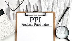 Paper with PPI -PRODUCER PRICE INDEX table on charts, business concept