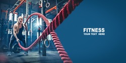 Woman with battle rope battle ropes exercise in the fitness gym. gym, sport, rope, training, athlete, workout, exercises concept
