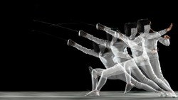 Teen girl in fencing costume with sword in hand on black background in strobe light. Young female model practicing, training in motion, action. Copyspace. Sport, youth, healthy lifestyle. Flyer for ad