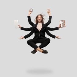 Beautiful business woman, secretary, multi-armed manager levitating isolated on grey studio background. Multi-task worker like Shiva. Concept of business, deadline, balance, time management.