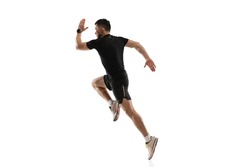 Caucasian professional sportsman training isolated on white studio background. Muscular, sportive man practicing.