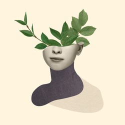 Beautiful female face with green leaves of plant on pastel yellow background. Copy space for ad, text. Modern design. Conceptual, contemporary bright artcollage. Retro styled, surrealism, fashionable.