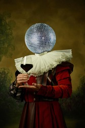 Model like medieval royalty person headed of disco ball in vintage clothing. Concept of comparison of eras, artwork, renaissance, baroque style. Creative collage. Surrealism