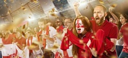 Emotions run high. Emotive shouting football, soccer fans from England cheering their team with white red scarfs at crowded stadium. Concept of sport, support, team event, competition and fight.