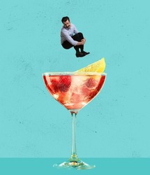 Contemporary art collage. Happy cheerful man jumping into refreshing tasty cocktail with fruity taste isolated over blue background. Concept of alcohol, addiction, party, taste. Pop art style, ad